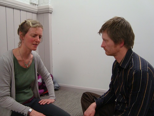co-counselling session on the floor